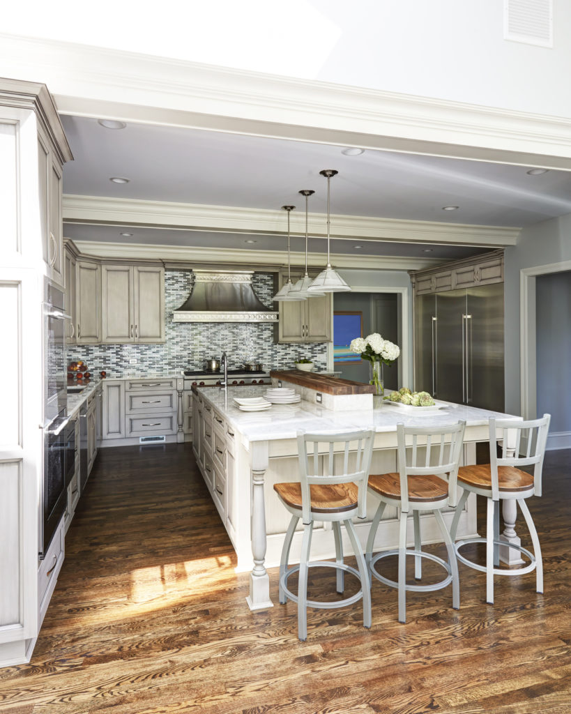 Painted warm grey kitchen in by Dream Kitchens